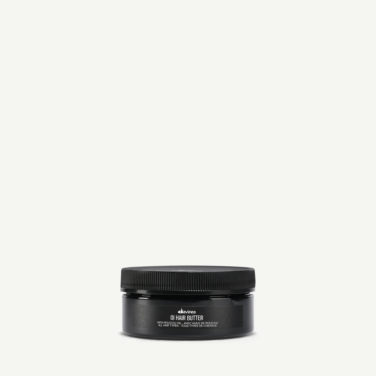Travel size of Davines OI Hair Butter on a white background