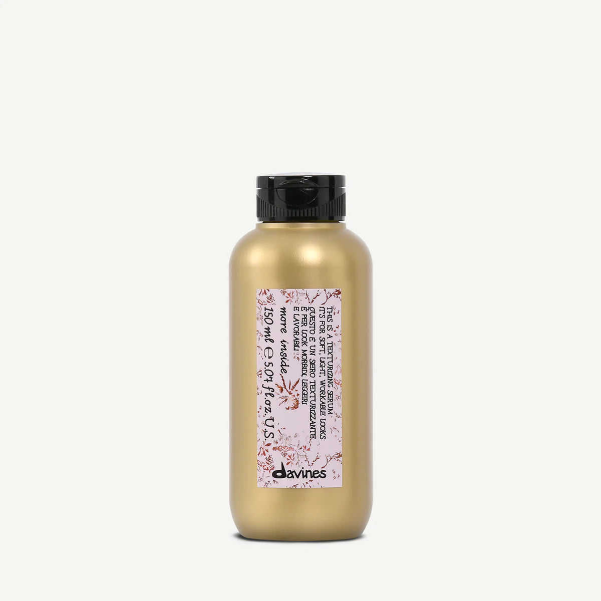 Gold bottle of Davines Texturizing Hair Serum against white background