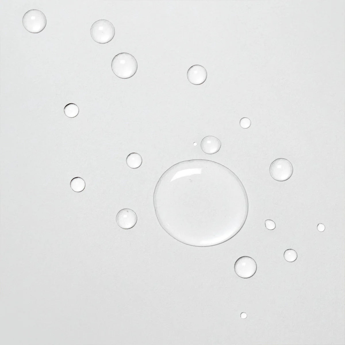 Clear droplets on a white background