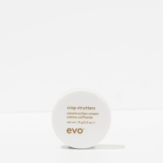 White container of evo crop strutters construction cream on a white background