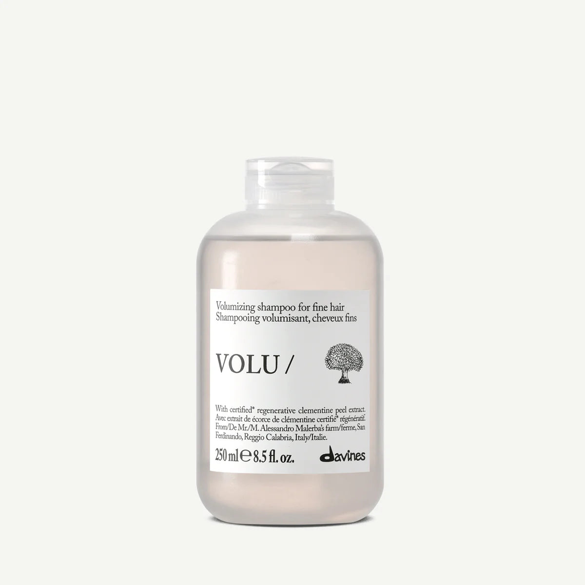 Davines Volu Shampoo with white label on a light grey background