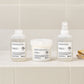 Davines Volu line with white labels on a beige shelf