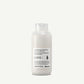 Bottle of Davines Love Curl Cream on a white background