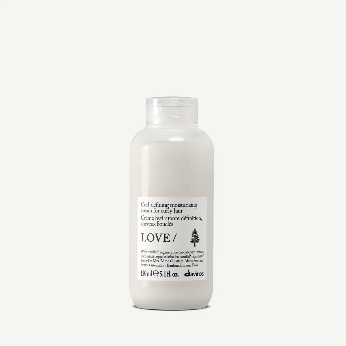 Bottle of Davines Love Curl Cream on a white background