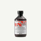 Bottle of Davines Naturaltech Energizing Shampoo on a white background