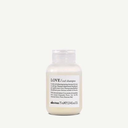 Travel size of Davines LOVE curl shampoo on a white background
