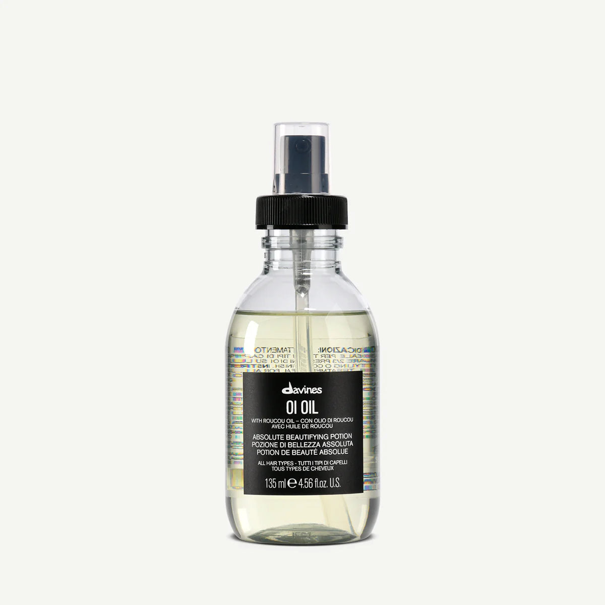 Bottle of Davines OI Oil on a white background
