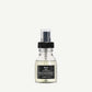 Travel-sized bottle of Davines OI Oil on a white background
