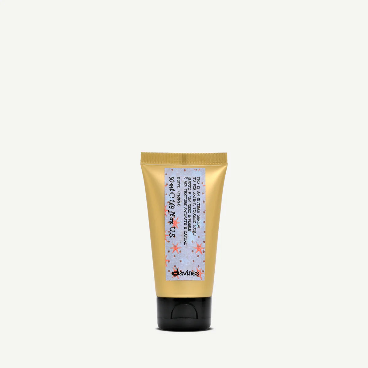 Gold tube with black base on a white background