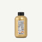 Bottle of Davines Medium Hold Modeling Gel with black cap on a white background