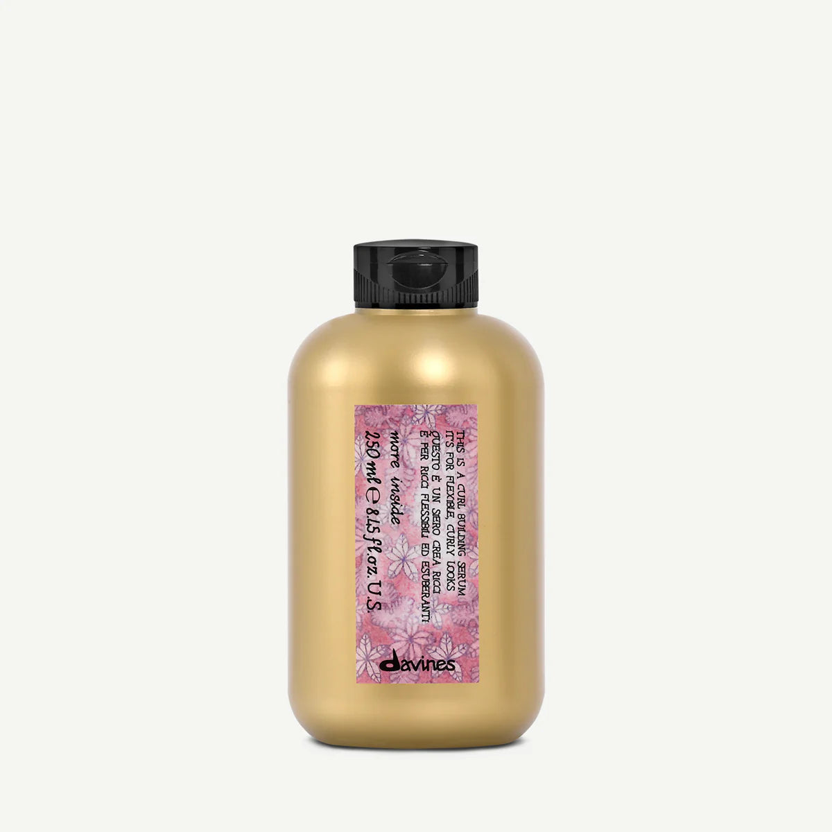 Gold bottle with pink label on a white background