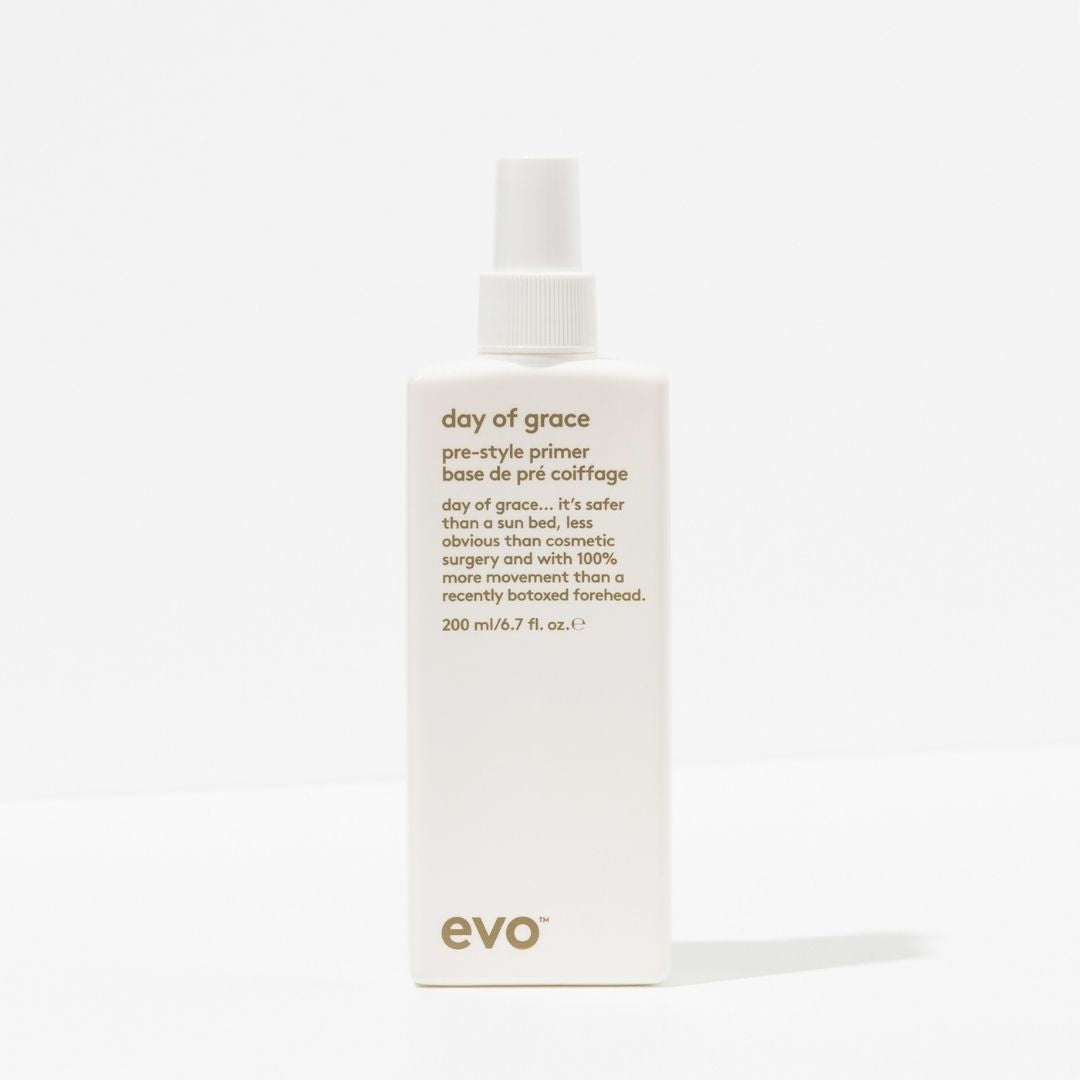 Evo Day of Grace pre-style primer bottle on a white background