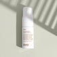 Evo styling powder bottle on a light background