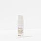 Evo styling powder bottle on a white background