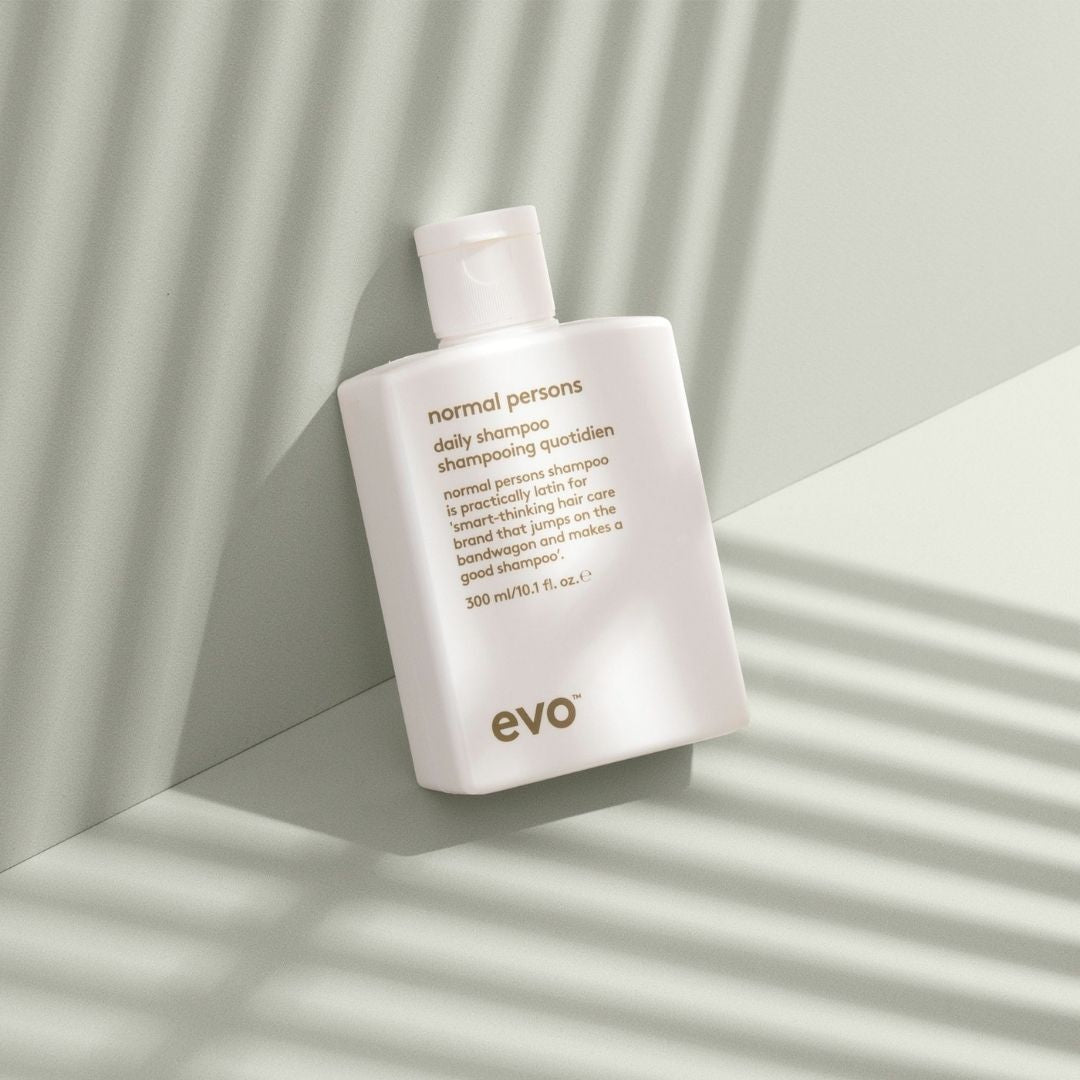 Evo shampoo bottle on a light background