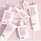 Collection of Evo hair care products on a pink background