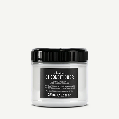Davines OI Conditioner jar on a white background
