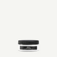 Travel jar of Davines OI Conditioner on a white background