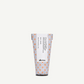 Hair product container with floral design and Davines logo on a white background