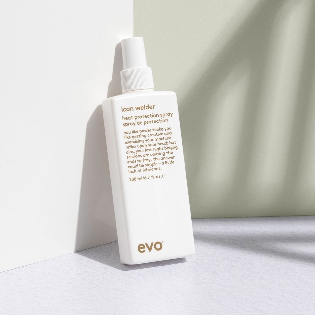 Evo heat protection spray bottle on a light background
