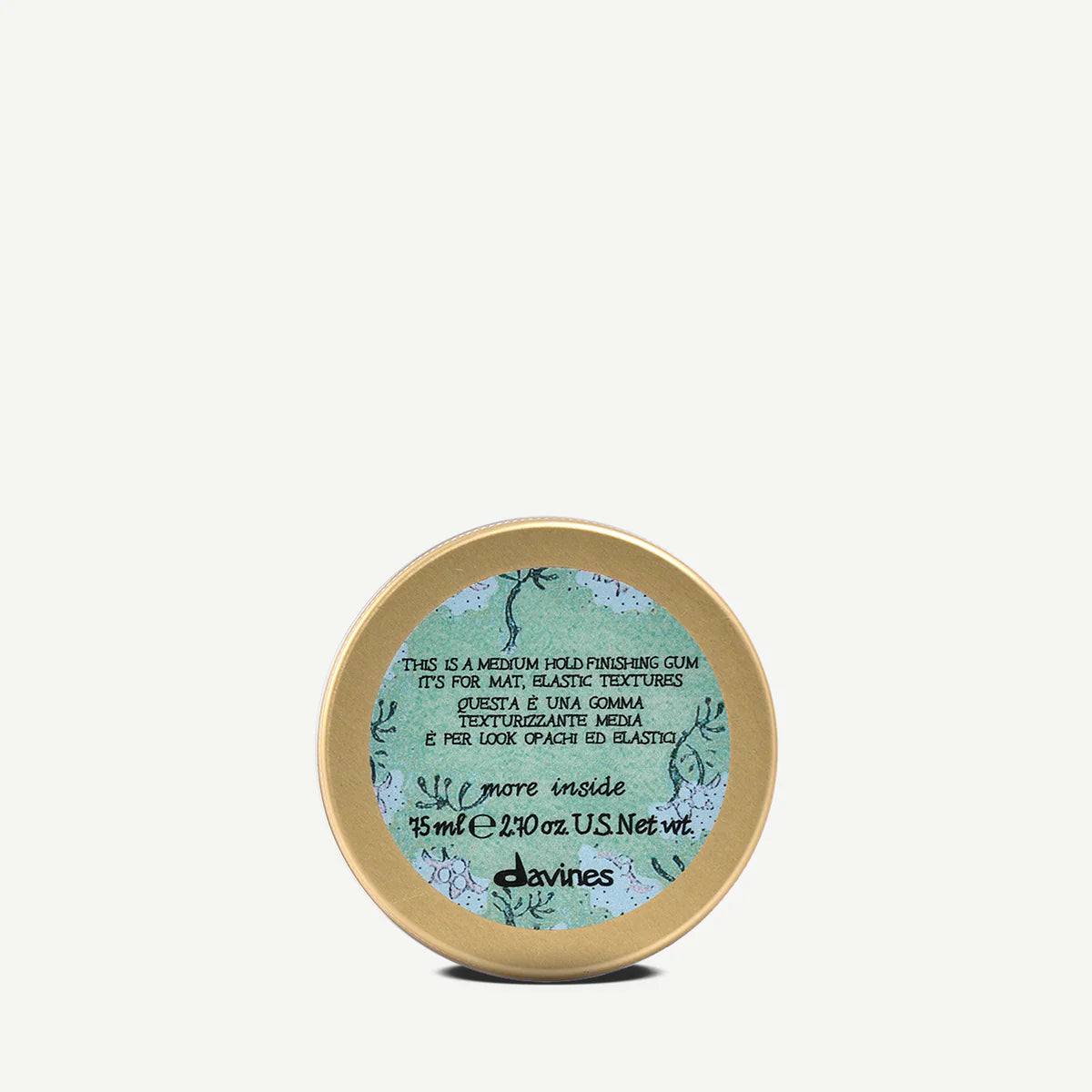 Davines Medium Hold Finishing Gum in gold container on a white background