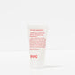 White bottle of evo ritual salvation repairing conditioner with red text on a white background