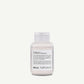 Shampoo bottle labeled 'VOLU/shampoo' by davines on a white background