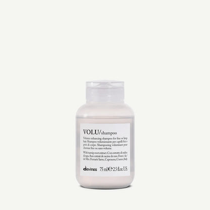 Shampoo bottle labeled 'VOLU/shampoo' by davines on a white background