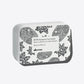 Davines shampoo bar holder with floral designs on a white background