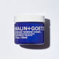 Blue jar of Malin+Goetz advanced renewal cream on a white background