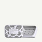Open Davines shampoo bar holder with floral design on a white background