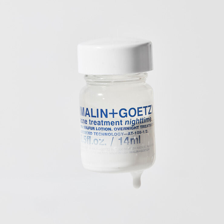 Skincare bottle labeled 'Malin+Goetz' on a white background