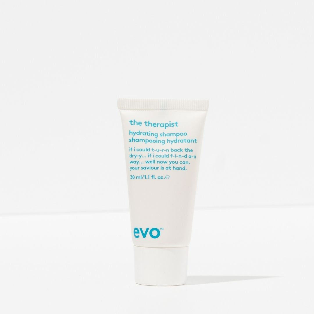 Tube of 'the therapist' hydrating shampoo by evo on a white background