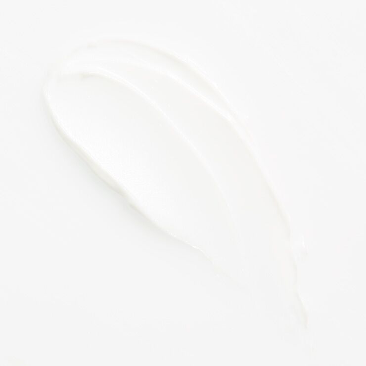 Swipe of hand cream on white surface