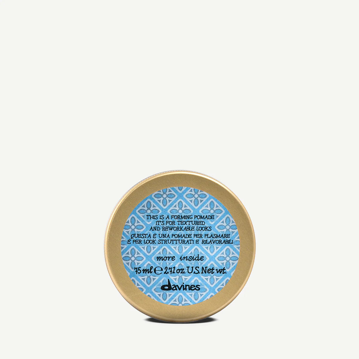 Small container of Davines Forming Pomade with a blue label on a white background